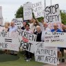 A crowd gathers to protest Labor's proposed changes to franking credits.