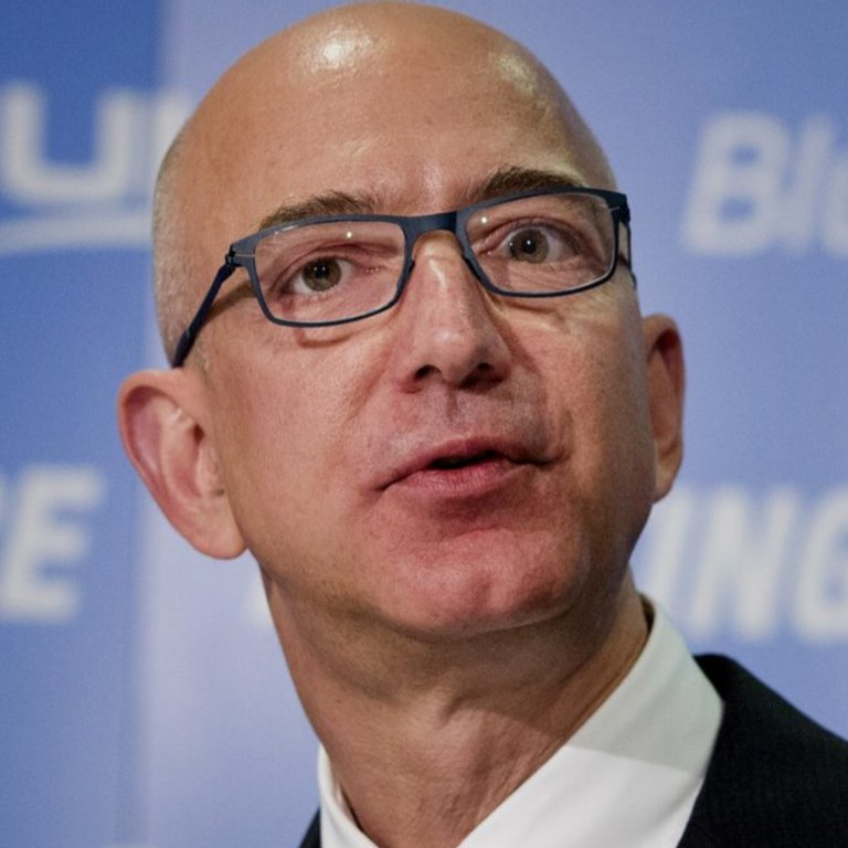 Bezos accuses magazine of trying to blackmail him over 'intimate photos'