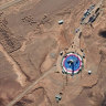 Satellite image shows a missile on a launch pad and activity at the Imam Khomeini Space Center in Iran's Semnan province  on Tuesday.