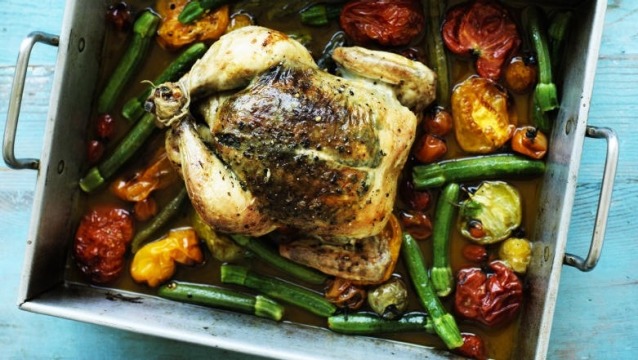 Rachel Khoo's roast chicken with herb butter and summer vegetables.