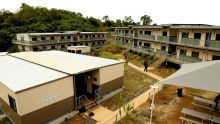 Buildings at the East Lorengau Refugee Transit Centre and West Lorengau Haus on Manus Island. 

