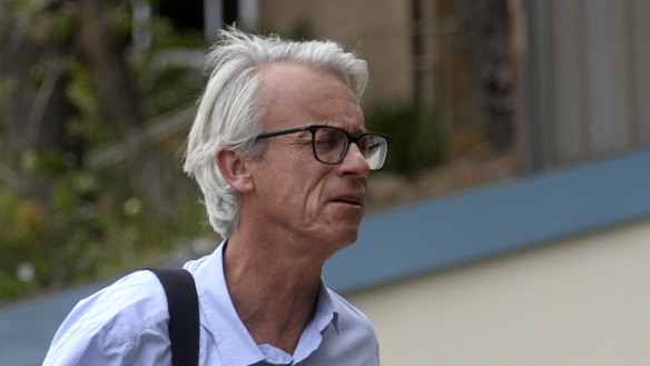 Position under scrutiny: David Gallop arrives at the Crowne Plaza hotel in January to meet Matildas players to explain why Alen Stajcic was suddenly sacked as coach.
