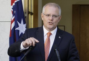 Australian Prime Minister Scott Morrison addresses media at Parliament House in Canberra, Australia, on Wednesday, Feb. 13, 2019