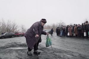 Life on the line, as seen through the eyes of an OSCE SMM monitoring officer, as thousands of people cross the contract line at Stanytsia Luhanska Bridge, struggling against the elements and inadequate infrastructure, and facing danger from mines. 