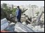 Man standing in rubble