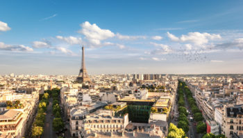 View of Eiffel Tower between trees, Paris, France