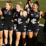 Loud and proud: Blues players belt out the club song after a solid win over the Lions.