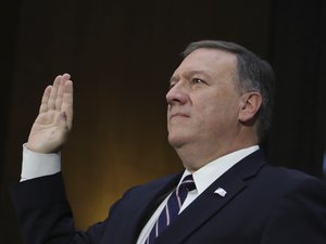 CIA Director-designate Rep. Michael Pompeo, R-Kan. is sworn in on Capitol Hill in Washington, Thursday, Jan. 1, 2017, prior to testifying at his confirmation hearing before the Senate Intelligence Committee.