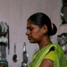 Chhaya Kharade, 36, an unemployed farm labourer makes tea inside her house in Chincholi, India, in March.