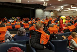 This photo provided by Michal Stewart shows passengers on board the Viking Sky, waiting to be evacuated, off the coast of Norway on Saturday, March 23, 2019.