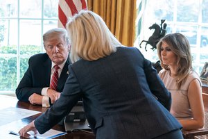 File - President Donald J. Trump and First Lady Melania Trump receive an opioid briefing by U.S Secretary of Homeland Security Kirstjen Nielsen in the Oval Office of the White House Tuesday, March 19, 2019, in Washington.