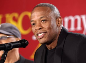 This May 15, 2013 file photo shows hip-hop mogul Dr. Dre as he announces a $70 million dollar donation to create the new "Jimmy Iovine and Andre Young Academy for Arts and Technology and Business Innovation," at the University of Southern California, in Santa Monica, Calif.