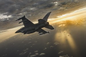 File - An F-16 Fighting Falcon flies over Eglin Air Force Base, Fla., Feb. 14, 2019.