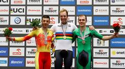 Mark Downey (right) celebrates his bronze