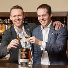 Liquid gold: Jack and Stephen Teeling raise a glass to their 24-year-old single malt, voted the best in the world. Photo: Naoise Culhane Photography