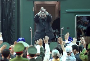 File - North Korean leader Kim Jong Un waves at Dong Dang railway station in Dong Dang, Vietnam, Saturday, March 2, 2019. Kim has boarded his private train at the Vietnam-China border, ending a trip that saw a summit breakdown with U.S. President Donald Trump.