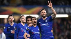 Pedro of Chelsea celebrates after scoring his team's first goal with Olivier Giroud of Chelsea and his Chelsea team mates during the UEFA Europa League Round of 16 First Leg match between Chelsea and Dynamo Kyiv. (Photo by Michael Regan/Getty Images)