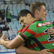 Rabbitohs celebrate a Campbell Graham try on Sunday. 