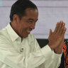 Joko Widodo, Indonesia's president, left, greets Prabowo Subianto, presidential candidate, right, on stage during a fourth presidential debate in Jakarta, Indonesia, on Saturday, March 30.