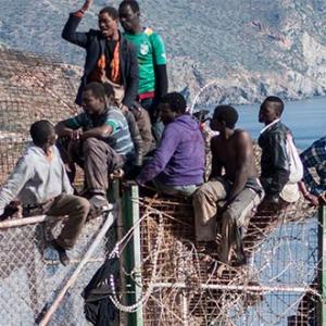 As Spain becomes the busiest staging post on the migrant Mediterranean route, Julian Hattem speaks to the African migrants in its North African enclaves.