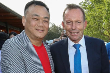 Jack Lam and Tony Abbott the Twin Creeks Golf and Country Club in 2018. 