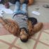 Yasser Fawzi Shweiki lies on the ground after being shot by the Israeli soldiers. Dozens of the court documents he was delivering can be seen scattered around his body.