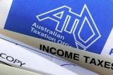 The OECD finds only six countries take less tax out of a single person's earnings than Australia.