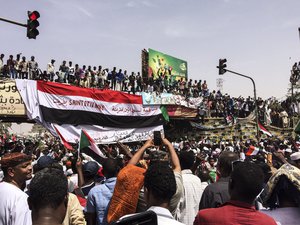 Demonstrators gather in Sudan's capital of Khartoum, Friday, April 12, 2019