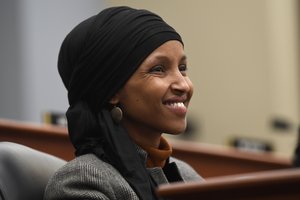 Rep. Ilhan Omar, D-Minn., listens as Office of Management and Budget Acting Director Russell Vought testifies before the House Budget Committee on Capitol Hill in Washington, Tuesday, March 12, 2019, during a hearing on the fiscal year 2020 budget.