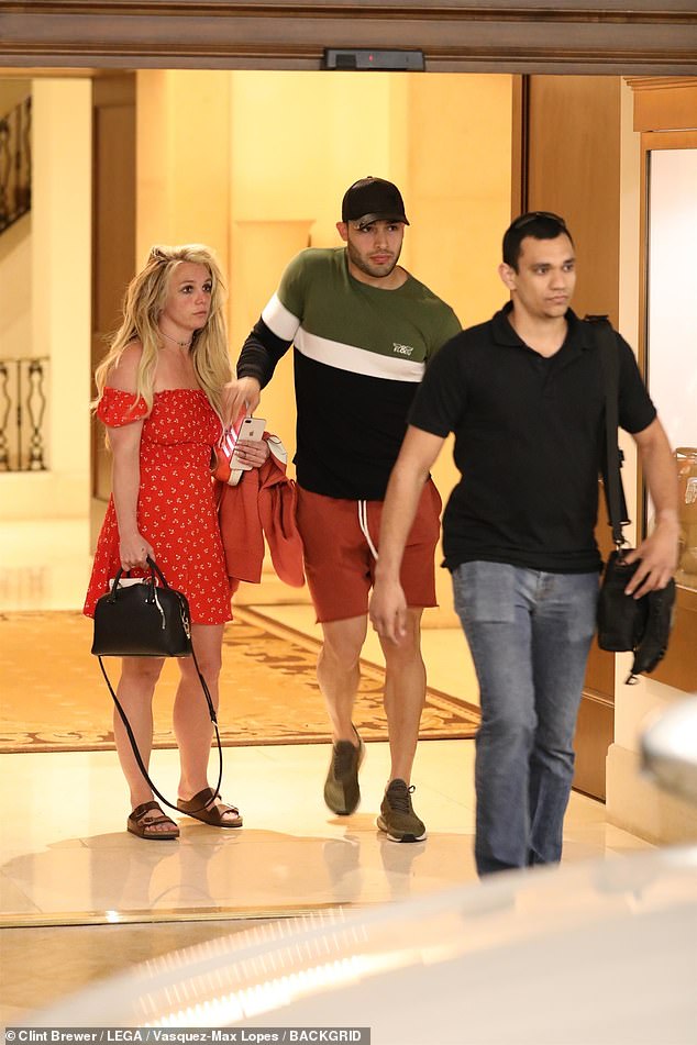 Out and about: Britney Spears enjoyed some time with her boyfriend Sam Asghari at The Montage hotel in Beverly Hills on Sunday afternoon nearly one month after voluntarily admitting herself into a mental health facility