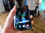 The Samsung Galaxy Fold smartphone is seen during a media preview event in London, Tuesday April 16, 2019.  Samsung is hoping the innovation of smartphones with folding screens reinvigorates the market. (AP Photo/Kelvin Chan)