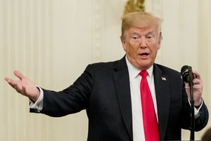 President Donald Trump speaks before presenting Valerie Nessel the Medal of Honor for her husband Air Force Tech. Sgt. John A. Chapman, posthumously for conspicuous gallantry, during a ceremony in the East Room of the White House in Washington, Wednesday, Aug. 22, 2018.