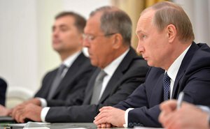 Russian President Vladimir Putin and Foreign Minister of Russia Sergei Lavrov during a discussion with US Secretary of State John Kerry