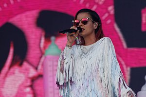 File - English singer and songwriter Lily Allen on stage at the Vieilles Charrues Festival, 2014.