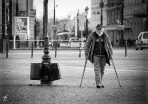 man with crutches