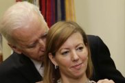 United States Vice President Joe Biden talks to Stephanie Carter (R) as her husband Ash Carter (not pictured) delivers his acceptance speech as the new Secretary of Defense at the White House in Washington February 17, 2015. Carter served as the deputy defense secretary, the department's number two position, from 2011 to 2013.    REUTERS/Gary Cameron   (UNITED STATES - Tags: POLITICS MILITARY)