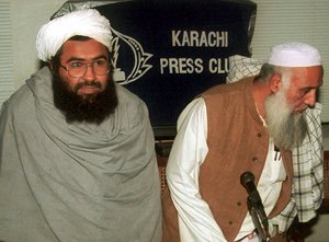 Masood Azhar, right, accompanied by leader of Harakat-ul-Mujahedeen Mufti Nizamuddin, speaks at Karachi press club, Friday, Feb 4, 2000.