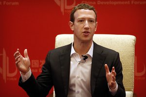 Facebook CEO Mark Zuckerberg speaks during a panel discussion held as part of the China Development Forum at the Diaoyutai State Guesthouse in Beijing, Saturday, March 19, 2016.