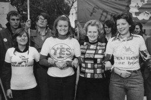 Newly-elected Conservative Party Leader of the Opposition, Margaret Thatcher (1925 - 2013) lends her support to 'Keep Britain in Europe' campaigners in Parliament Square, London, on 4th June 1975, the day before voting in the United Kingdom EEC referendum. Thatcher wore a sweater featuring the flags of European member states. Just over two-thirds of voters backed continued British membership. (Photo by P. Floyd/Daily Express/Hulton Archive/Getty Images)