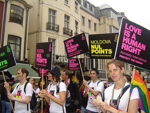 File - Amnesty international march "Love is a human right" for Gay Pride in Brighton, England.