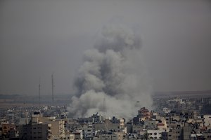 Smoke rises from an explosion after an Israeli airstrike in Gaza City, Sunday, May 5, 2019.