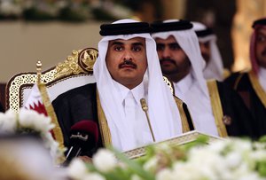 FILE- In this Tuesday, Dec. 9, 2014 file photo, Qatar's Emir Sheikh Tamim bin Hamad Al-Thani attends a Gulf Cooperation Council summit in Doha, Qatar. Bahrain says it is cutting diplomatic ties to Qatar amid a deepening rift between Gulf Arab nations.