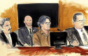 In this April 13, 2018 courtroom sketch Keith Raniere, second from right, leader of the secretive group NXIVM