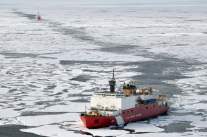 ARCTIC OCEAN - Coast Guard Cutter Healy breaks ice ahead of the Canadian Coast Guard Ship Louis S. St-Laurent Aug. 24, 2009. The two ships are taking part in a multi-year, multi-agency Arctic survey that will help define the Arctic continental shelf.(U.S. Coast Guard photo by Petty Officer Patrick Kelley) (665752) ( )