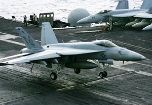 An FA18 Hornet lands on the flight deck of the USS Ronald Reagan during the Valiant Shield 2006 naval exercises off Guam in the Pacific Ocean, Wednesday, June 21, 2006.