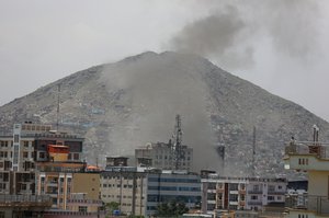 Smokes rises after a huge explosion near the offices of the attorney general in Kabul, Afghanistan, Wednesday, May 8, 2019.