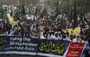 Supporters of Pakistani radical religious Tehreek-e-Labbaik party protest against a Christian woman Asia Bibi, in Lahore, Pakistan, Friday, Oct. 19, 2018.