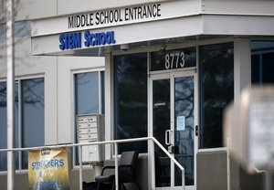 Doors are closed at the STEM Highlands Ranch school early Wednesday, May 8, 2019, in Highlands Ranch, Colo. (AP Photo/David Zalubowski)