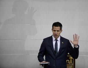 Venezuelan lawmaker Juan Guaido swears in as President of the National Assembly in Caracas, Venezuela, Saturday, Jan. 5, 2019.