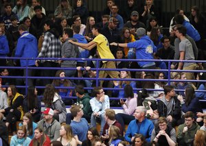 Students leave during a community vigil to mark the attack on the STEM Highlands Ranch school late Wednesday, May 8, 2019, in Highlands Ranch, Colo. (AP Photo/David Zalubowski)